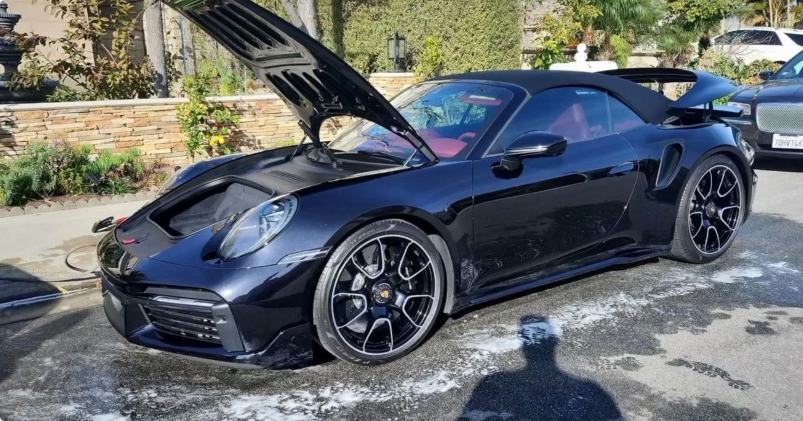 Glossy black car with mirror-like wax finish