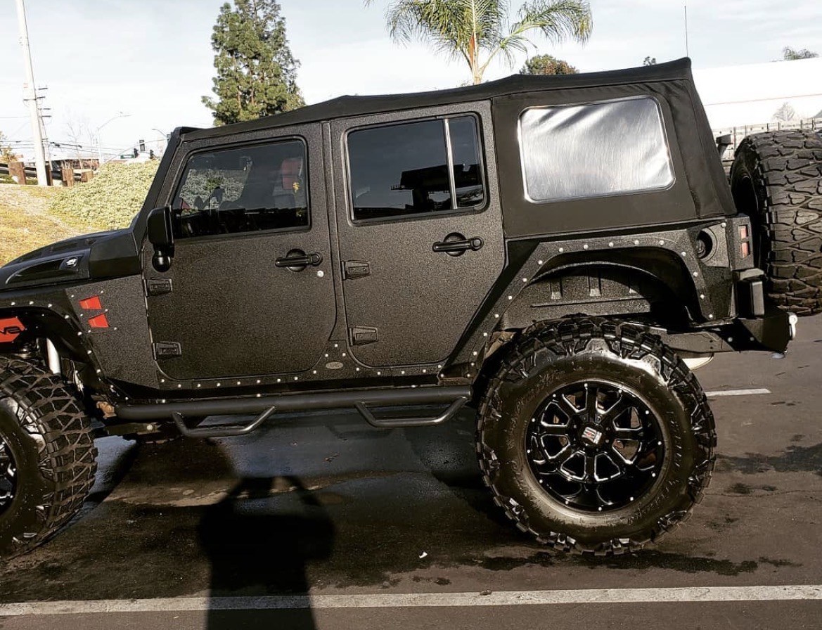 Lifted black Jeep Wrangler detail